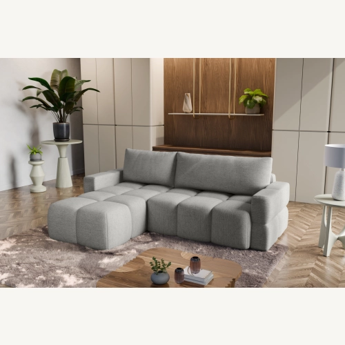 Fumo Komfortowa sofa narożna pikowana Tkanina Neve 83
